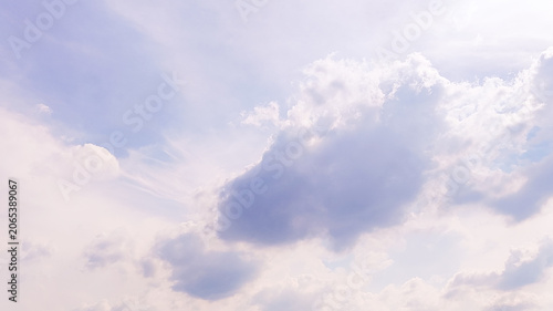 cumulus clouds in the bright blue sky during daytime.
