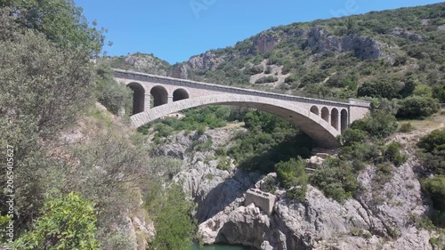 Pont du Diable Bridge Spanning Verdant Gorge in Occitanie, France