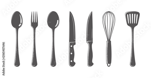Foto Collection of dark gray kitchen utensils including spoons forks knives whisk and