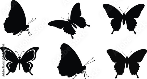 Black silhouette butterflies in various poses