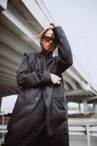Fashion street portrait of a modern emotional woman