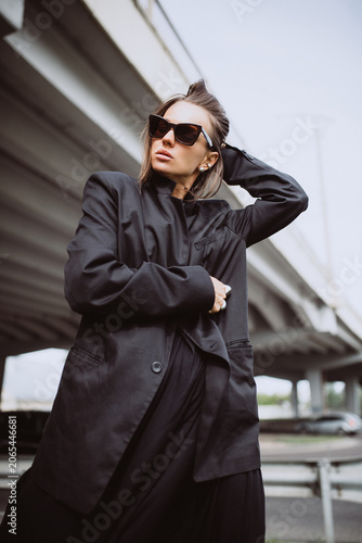 Fashion street portrait of a modern emotional woman