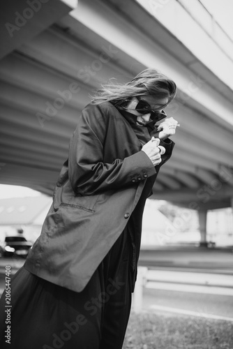 Fashion street portrait of a modern emotional woman