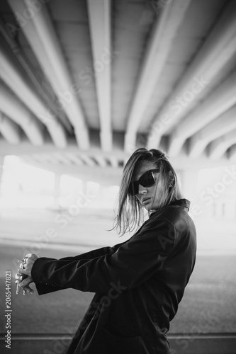 Fashion street portrait of a modern emotional woman