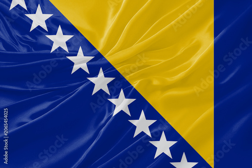 Schilderij op canvas Bosnia and Herzegovina Flag Waving Textures Silk Background