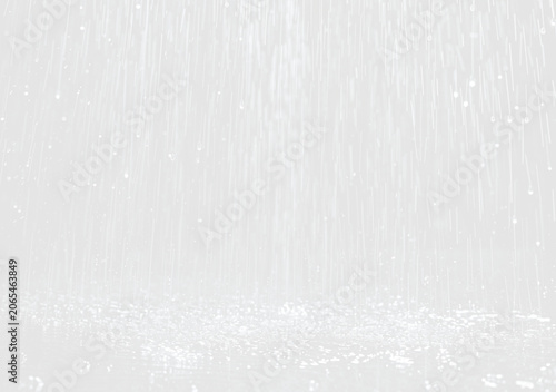 Foto Rainfall with water droplets cascading down against a light gray background, cre
