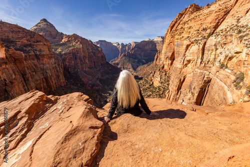 Fotografie Rear view of senior blonde woman at Zion Overlook