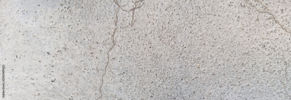 © Arbaz - Weathered concrete texture with cracks, industrial gray cement wall background, rustic stone surface for architectural design and overlays © Arbaz - Weathered concrete texture with cracks, industrial gray cement wall background, rustic stone surface for architectural design and overlays