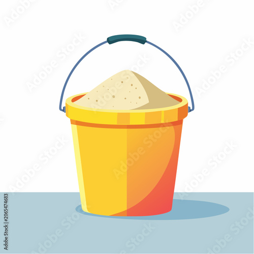 Yellow bucket filled with sand