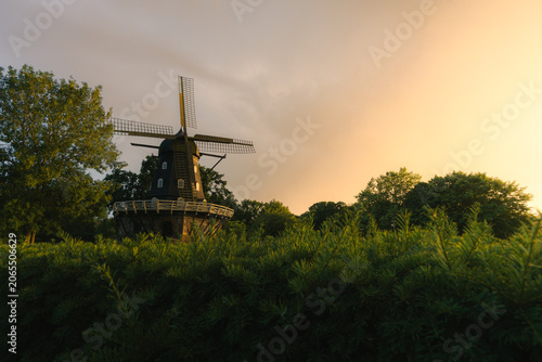 windmill in the park at sunset