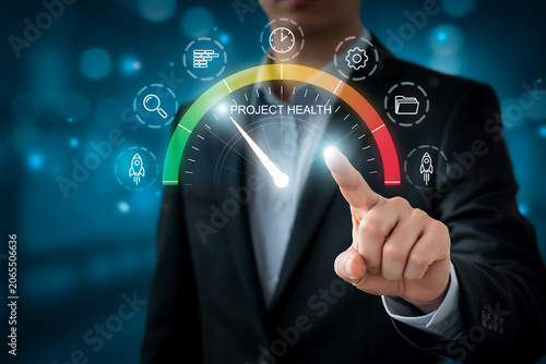 Businessman Pointing to Virtual Project Health Dashboard Meter Gauge, Concept for Corporate Management Performance Tracking and Analysis