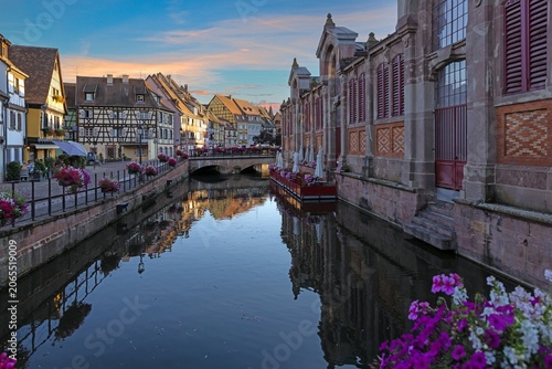 Historic Market Hall And Canal In Colmar France At Sunset