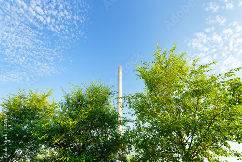 Concrete chimney of a central heating plant in Paris suburb. Ivry-sur-Seine city