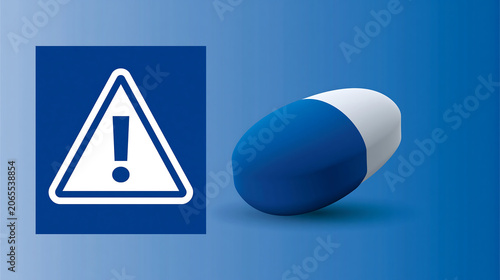 dangerous pharmaceutical pill capsule beside exclamation warning triangle sign on red background health and medicine alert concept