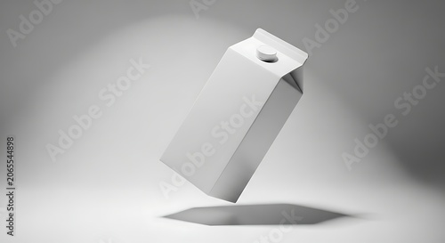 Milk carton stands isolated against a neutral background to provide a clean space for branding designs.
