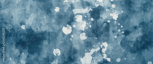 Blue watercolor texture with white splashes and stains