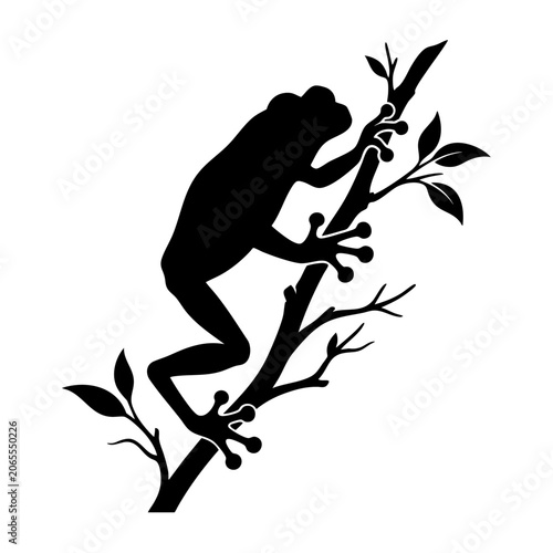 Canvas Print A monkey climbs up a tree branch with leaves.