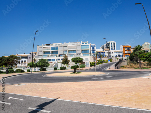 View in Alicante with Palm Trees and Mediterranean Architecture in Spain