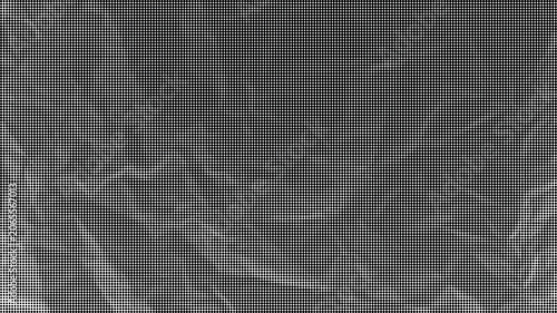 Cuadro en lienzo A close-up view of crumpled paper texture in a dark environment