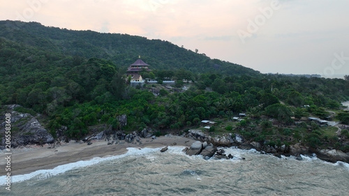 Canvastavla Aerial view of Puri Tri Agung temple on a green hill by the coast of Bangka Island, Indonesia