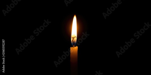 Single candle flame glowing...