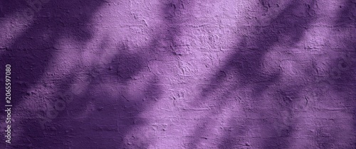 Purple brick wall with shad...