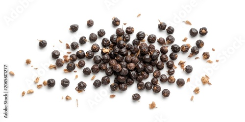 Isolated black peppercorns ...