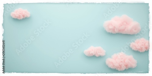 Light blue background with a vintage white border adorned by playful pink cloud shapes in a minimal design