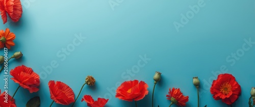 Red flowers arranged on a b...