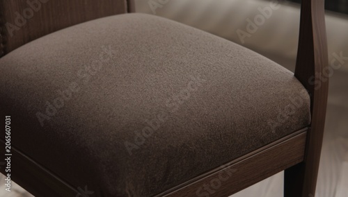 Brown upholstered chair sea...