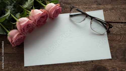 Pink rose blooms arranged w...