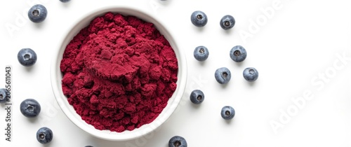 Red berry powder in a white...