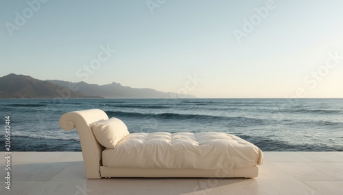 Lounge chair by the ocean w...