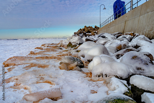snowy stones at the pier