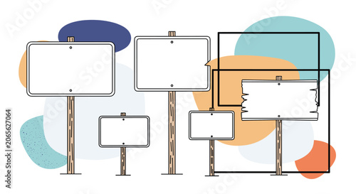 Various empty wooden signs and placards of different sizes and shapes arranged against an abstract colorful background.