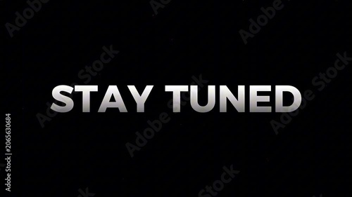 A powerful and engaging 'Stay Tuned' message, prominently displayed in sleek metallic typography on a deep black background, conveying future announcements and exciting upcoming content