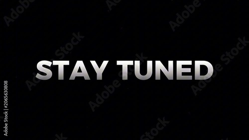 Sleek metallic 'STAY TUNED' typography on a minimalist black background, signaling upcoming announcements, future content, or an exciting, anticipated event