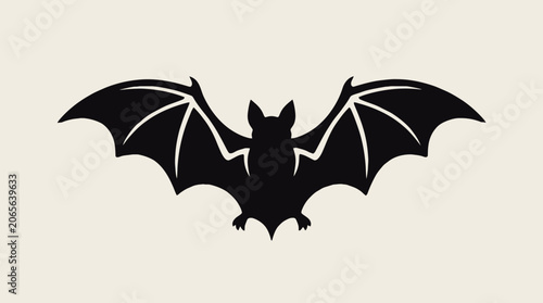 Black silhouette of a flying bat.
