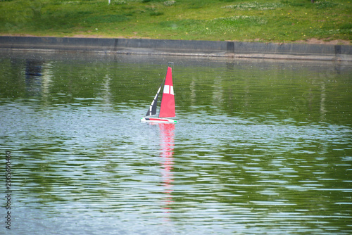 A boat floats on a lake