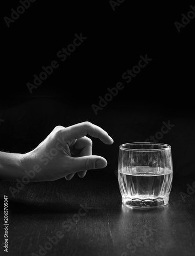 Obraz na plátně An optimist and a pessimist's opinion about a glass of water