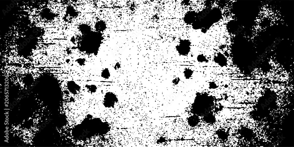 Fototapeta premium Abstract grungy texture with black ink splatters and white distressed background.