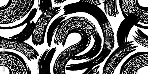 Photography A striking monochrome pattern featuring bold, abstract brush strokes interwoven with intricate tribal-inspired geometric designs