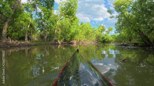 Immersive POV from a kayak - paddling on Boedecker Reservoir in Loveland, Colorado, on calm lake or river