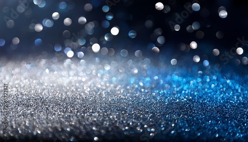 background of abstract glitter lights silver blue and black de focused © Abigail