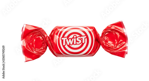 Red candy wrapper with circular twist logo glossy texture and reflective highlights on transparent background sweet confection packaging