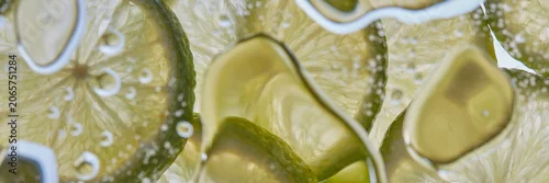 Panel kuchenny z motywem Lemon and lime slices macro citrus texture background