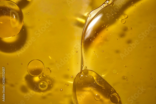 Close-up of Transparent Liquid with Bubbles and Viscous Texture