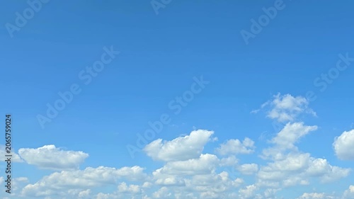 Cloudscape, Timelapse of Blue Sky with Fluffy White Cumulus Clouds along Horizon for Background and Banner Design
