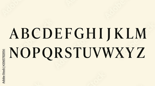 Bold black serif alphabet on ivory background
