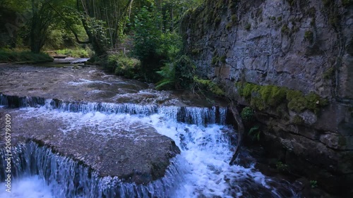 Landscape along a river near San Pedro del Romeral. Pas-Miera region. Pasiegos Valleys. Cantabria. Spain. Europe